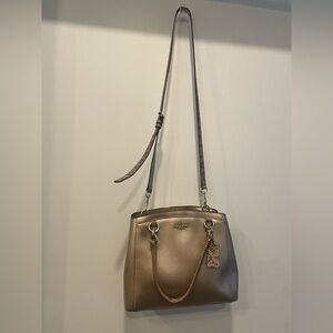 The Coach Christie Carryall in Gold/Snake print